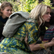 Evelyn (Emily Blunt) and her kids Regan (Millicent Simmonds) and Marcus (Noah Jupe) crouch to hide in A Quiet Place Part II.
